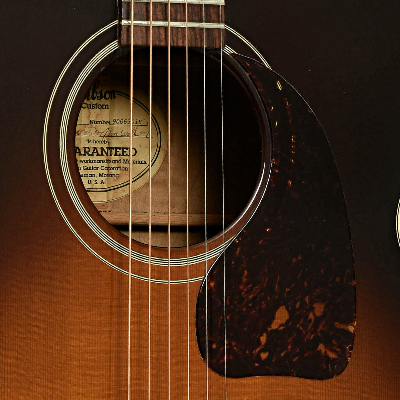 Soundhole of Gibson J-100 Custom Acoustic Guitar