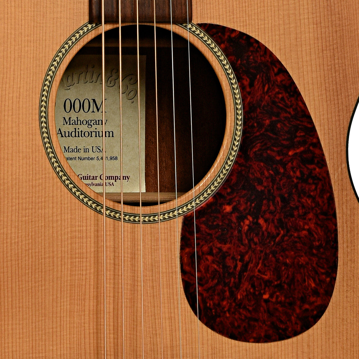 Soundhole of Martin 000M Acoustic Guitar 