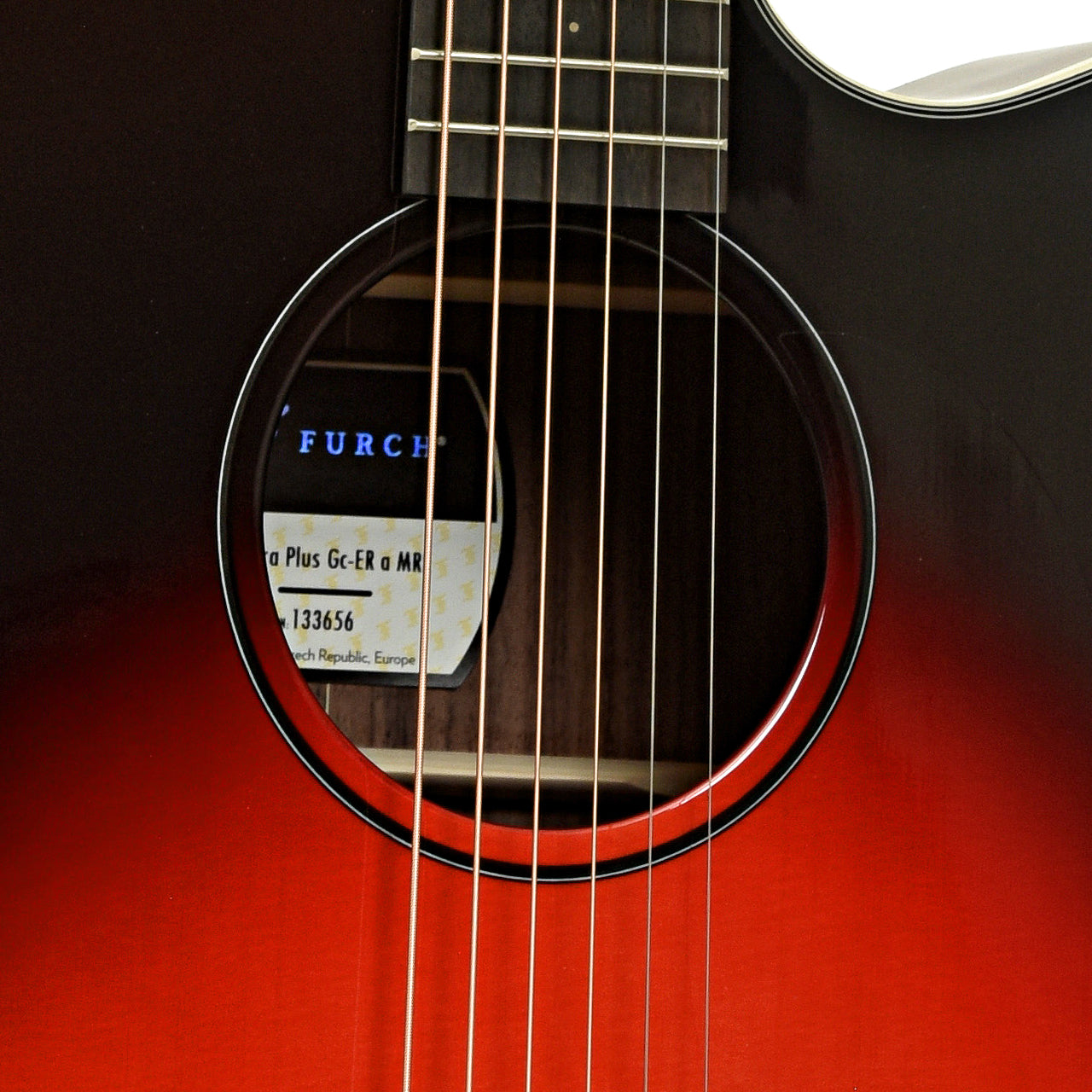 Soundhole of Furch Spectra Plus Gc-ER a Maranello Red Acoustic Guitar