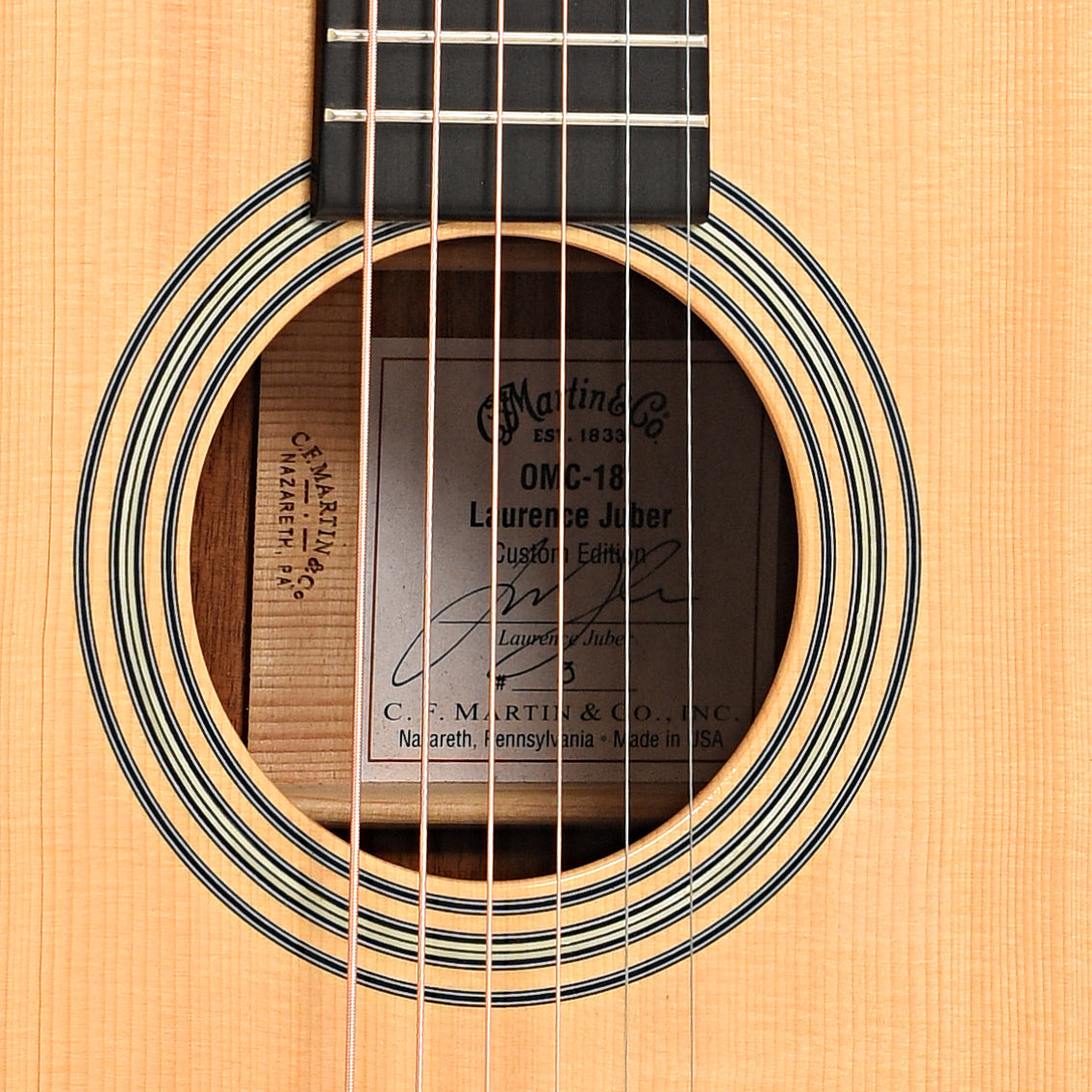 Sound hole of Martin OMC-18 Laurence Juber Acoustic Guitar (2007)