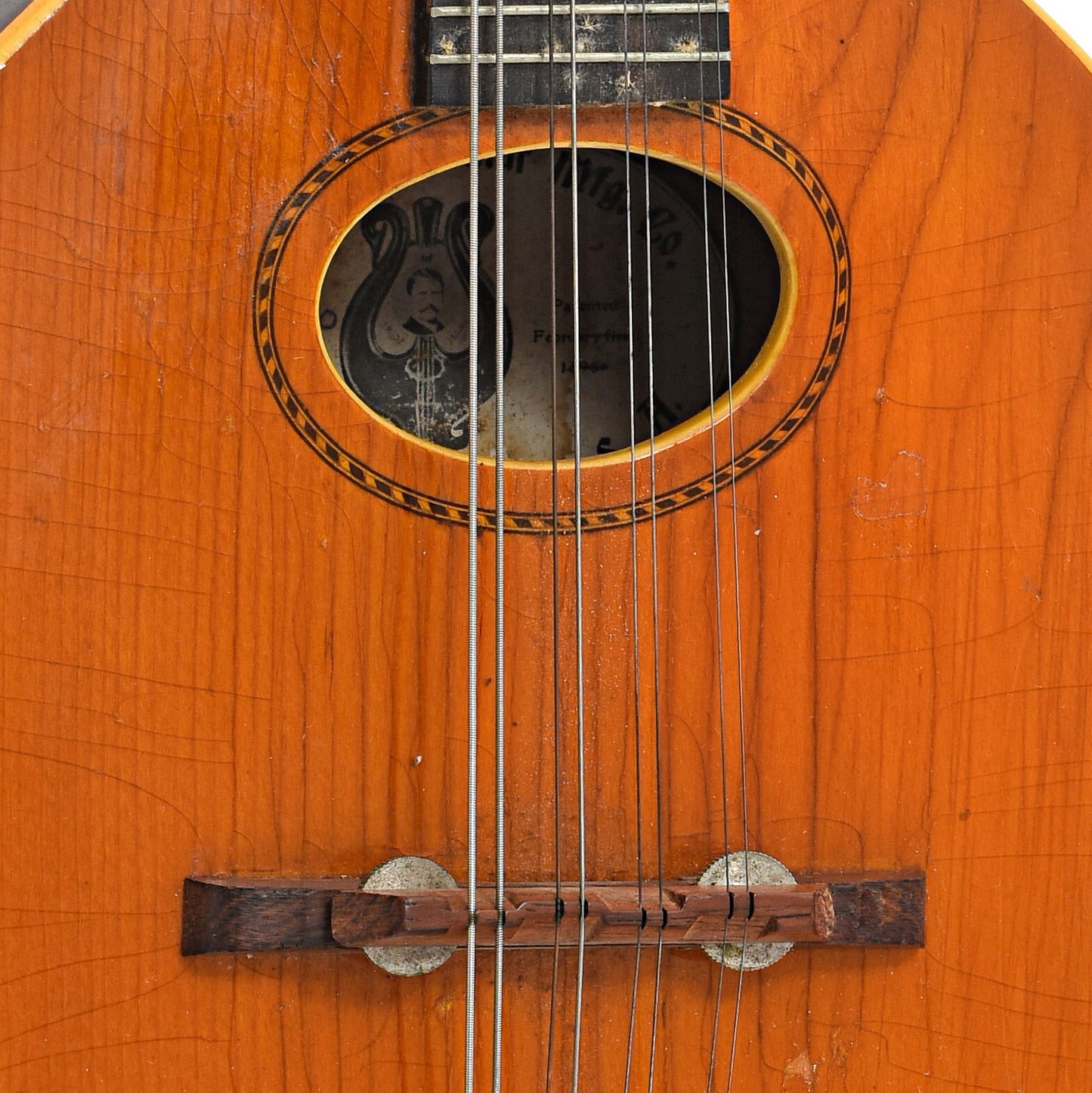 Sound hole and  bridge of Gibson A Mandolin (1908)