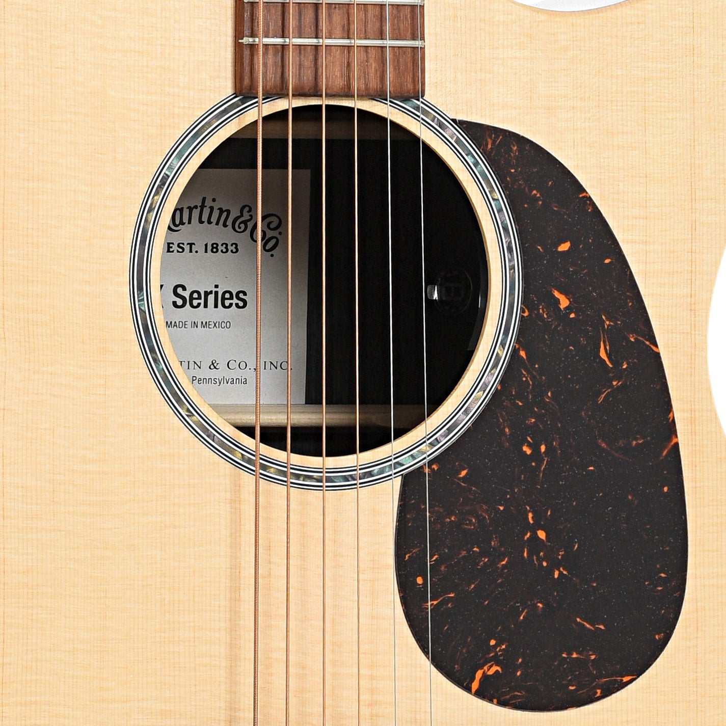 Sound hole and pickguard of Martin GPC-X2E Cocobolo Acoustic Guitar