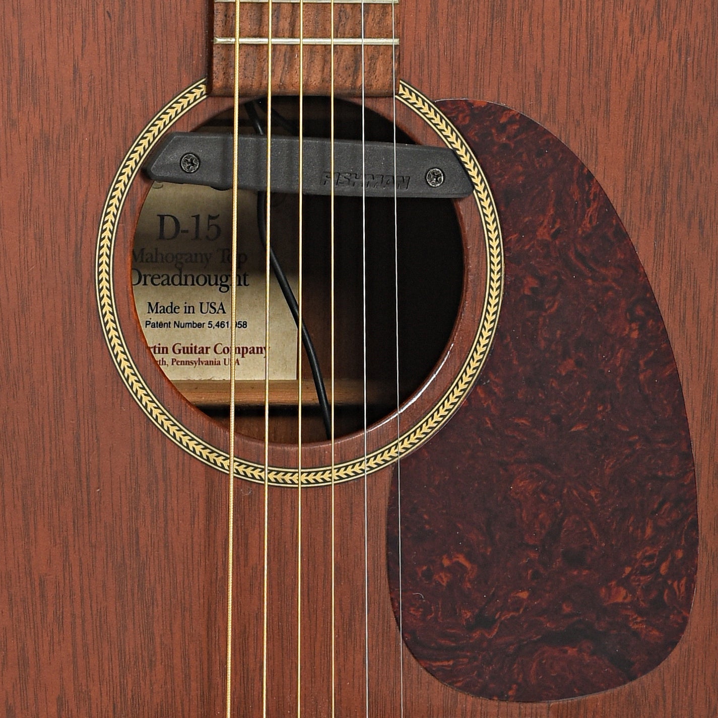 Soundhole and pickup of Martin D-15 Mahogany Top Dreadnought Acoustic Guitar (1998)