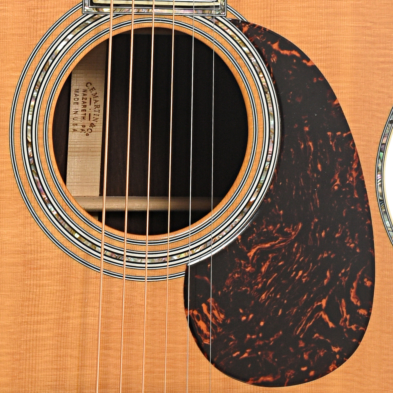 soundhole and pickguard of Martin 000-42 Acoustic Guitar (2004)