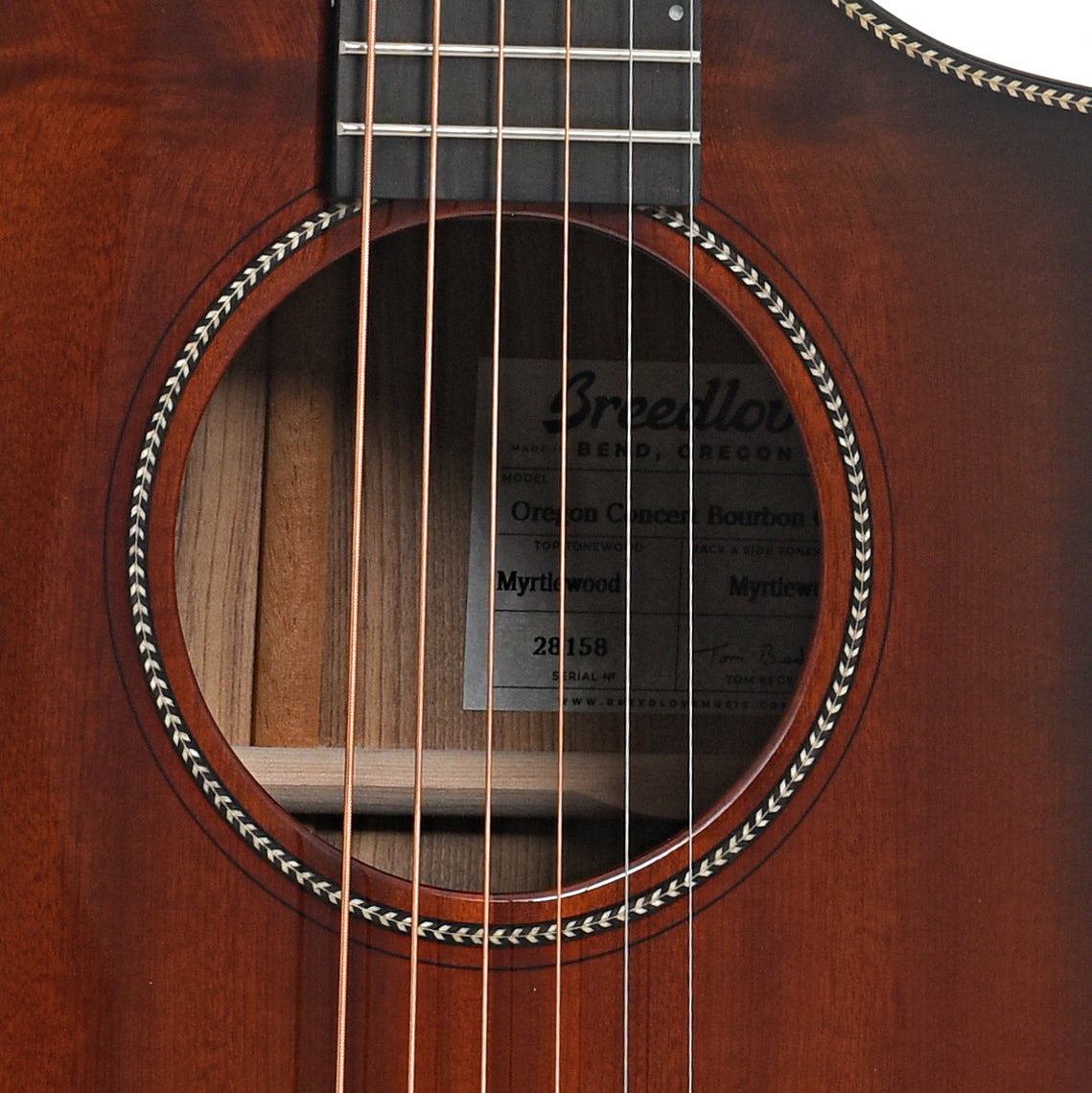Sound hole of Breedlove Oregon Series Concert Bourbon CE Myrtlewood