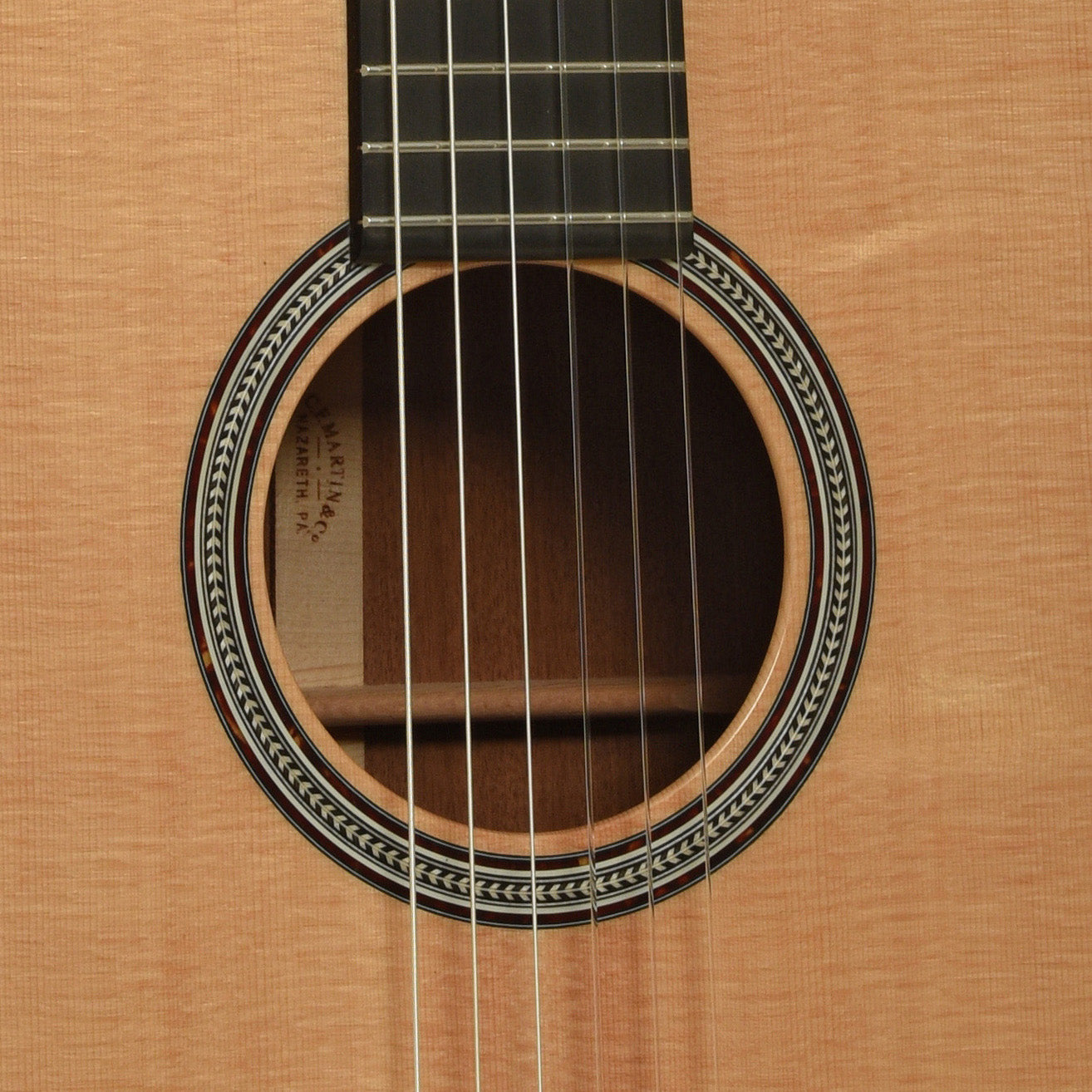 Soundhole of Martin 000C Nylon String Acoustic-Electric Guitar