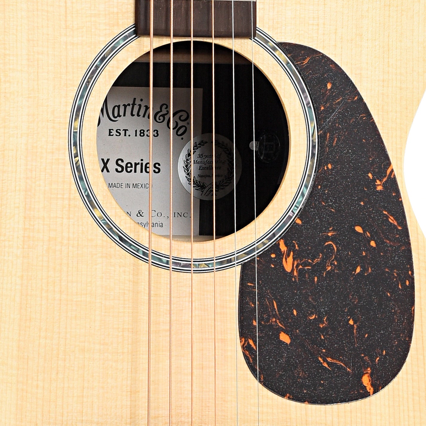 Sound hole of Martin 0-X2E Cocobolo Acoustic Guitar