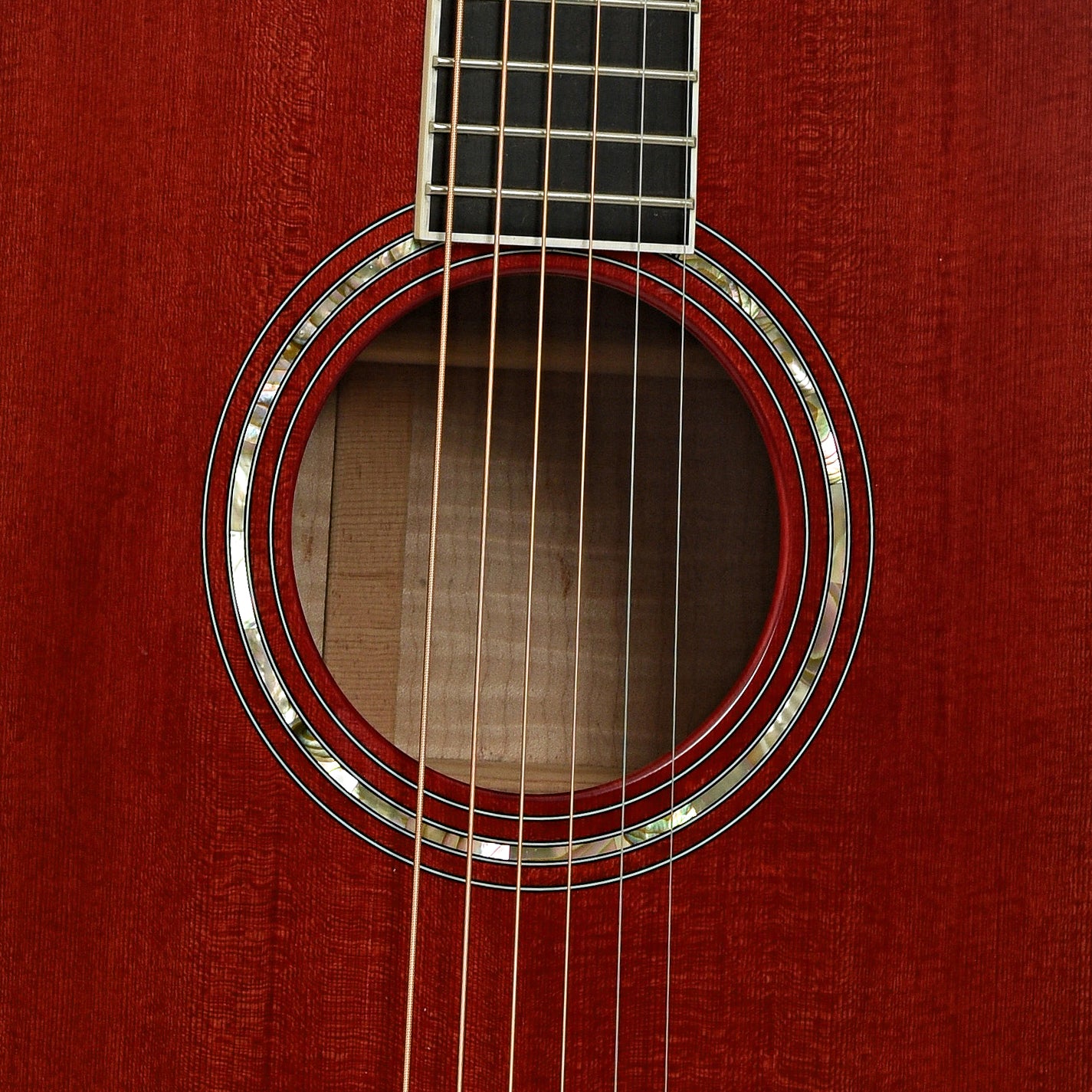 Soundhole of Taylor 610 Transparent Red Acoustic Guitar 