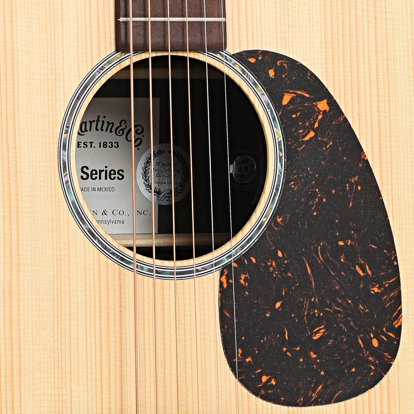Sound hole and pickguard of Martin D-X2E Brazilian Rosewood Acoustic