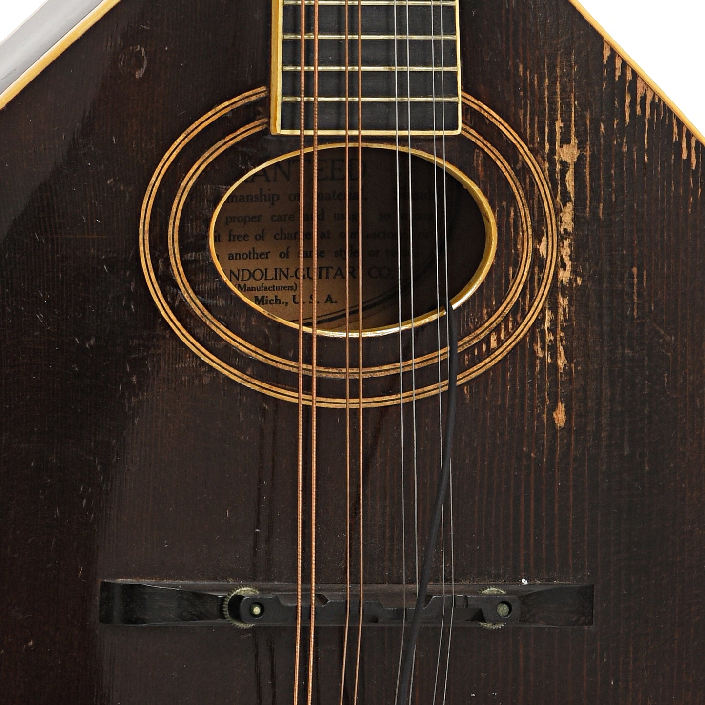 Sound hole and bridge of Gibson A-2 Mandolin (1922)