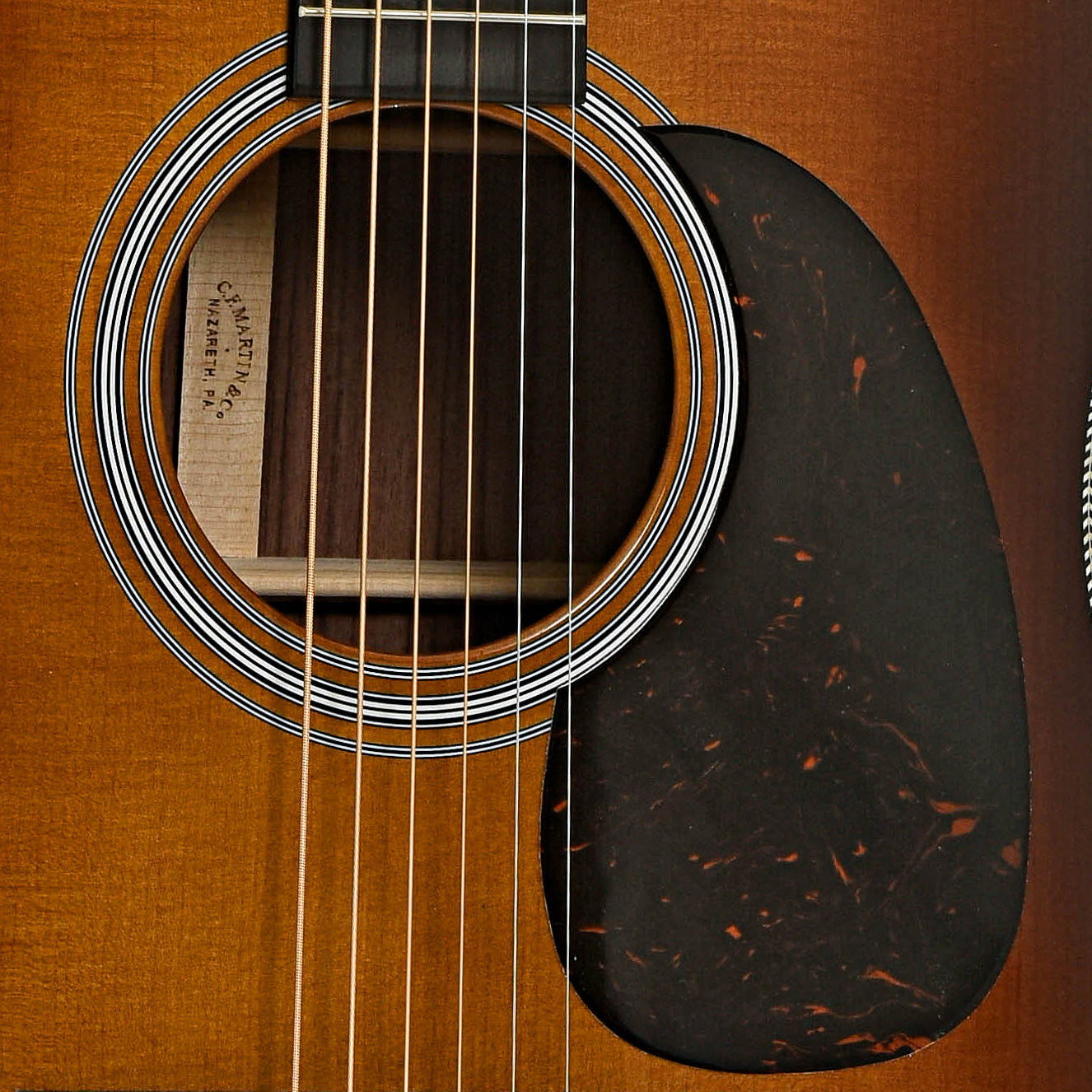 Soundhole of Martin HD-28 Ambertone Guitar & Case