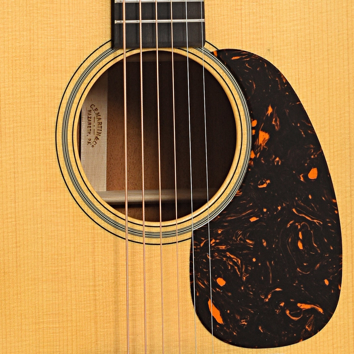Sound hole and pickguard of Martin D-18 Satin Acoustic Guitar