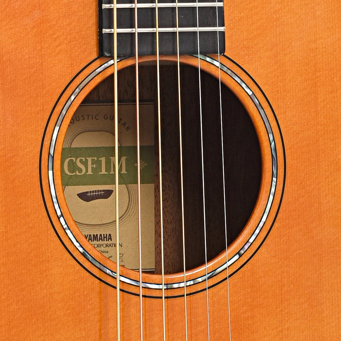 Sound hole of Yamaha CSF1M Parlor Acoustic Guitar (c.2022)