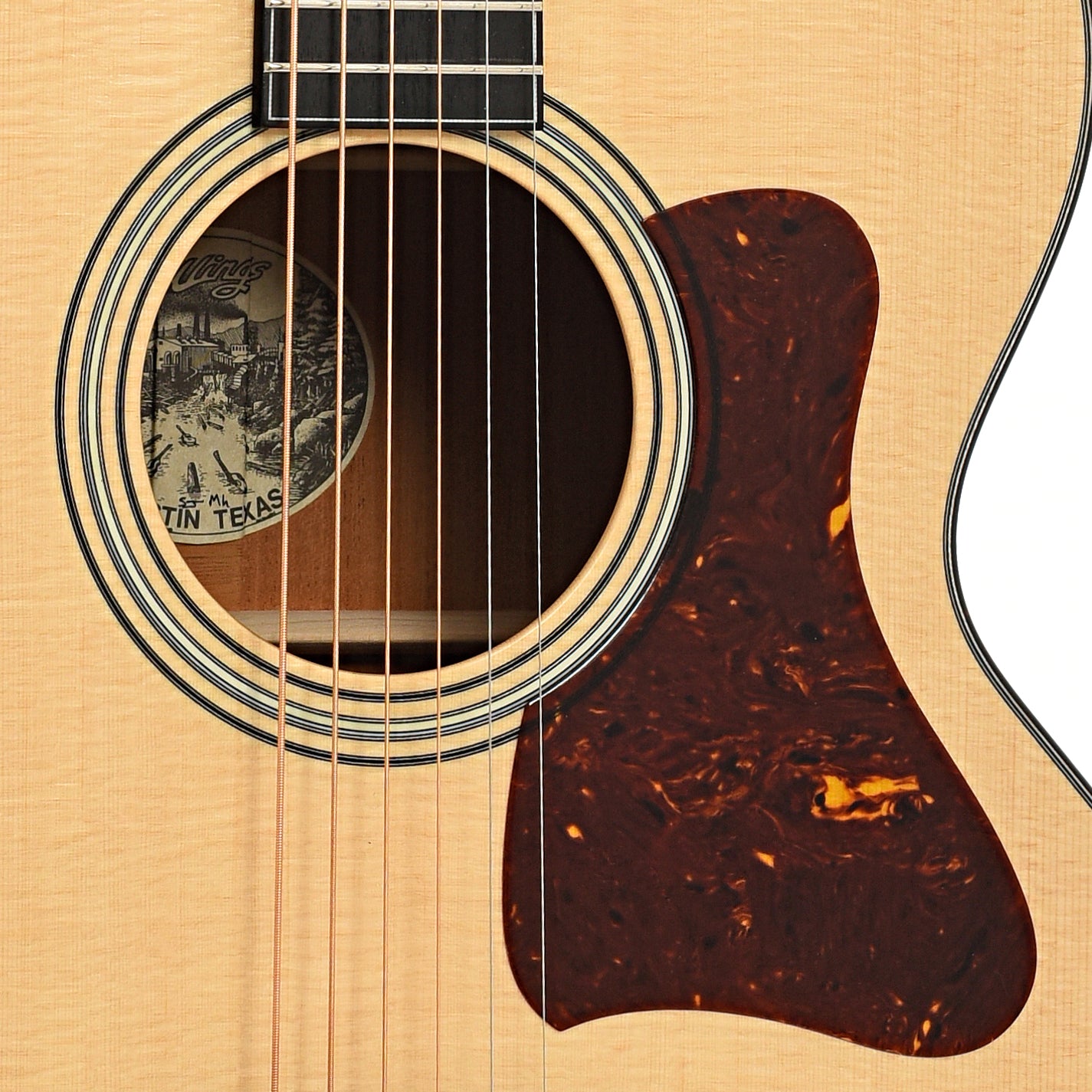 Sound hole and pickguard of Collings SJ Mahogany Guitar