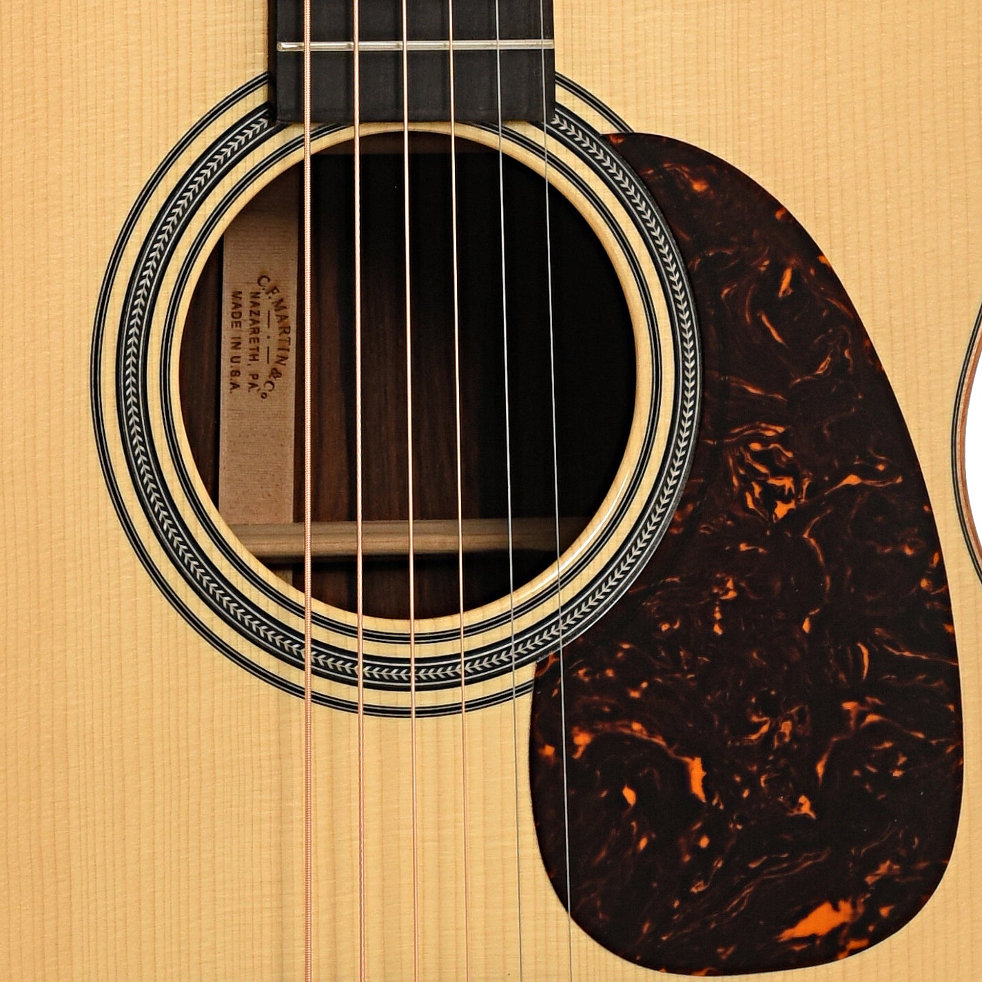 Sound hole and pickguard of Martin M Custom Acoustic