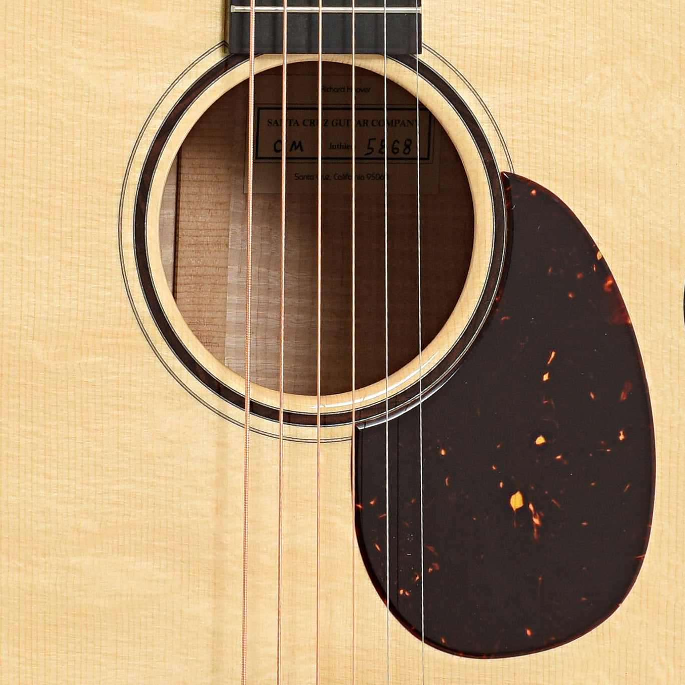 Sound hole of Santa Cruz OM Maple Custom Acoustic Guitar