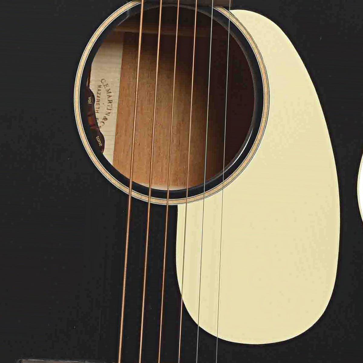 Soundhole of Martin 00L-16E Acoustic Guitar, Black Smoke