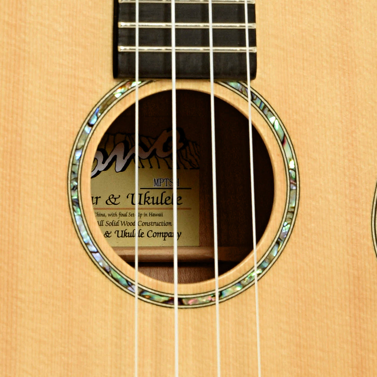 Soundhole of Pono MPTSH Tenor Ukulele