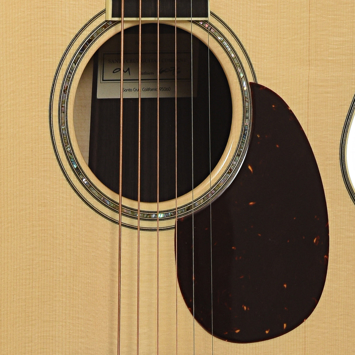 Soundhole of Santa Cruz OM Custom Cutaway Acoustic Guitar