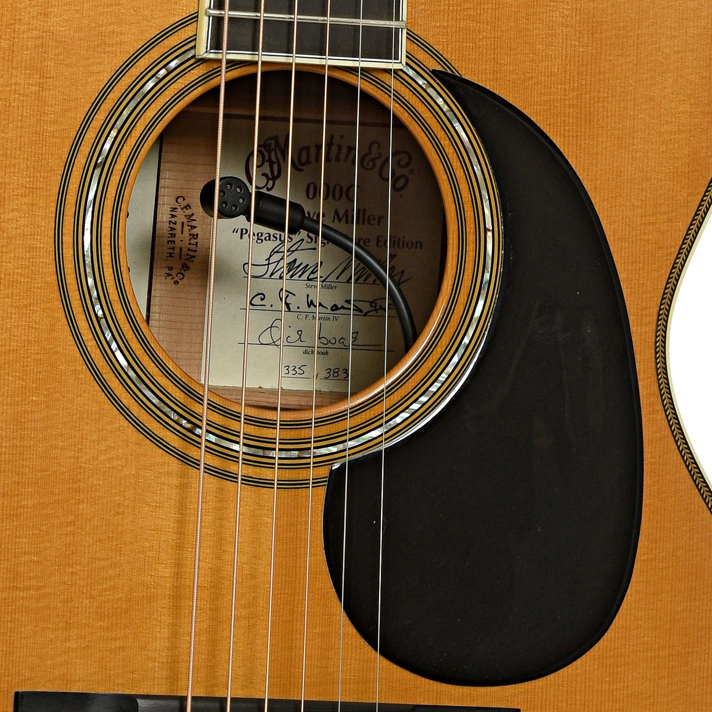Soundhole of Martin 000C Steve Miller Pegasus Signature Acoustic Guitar