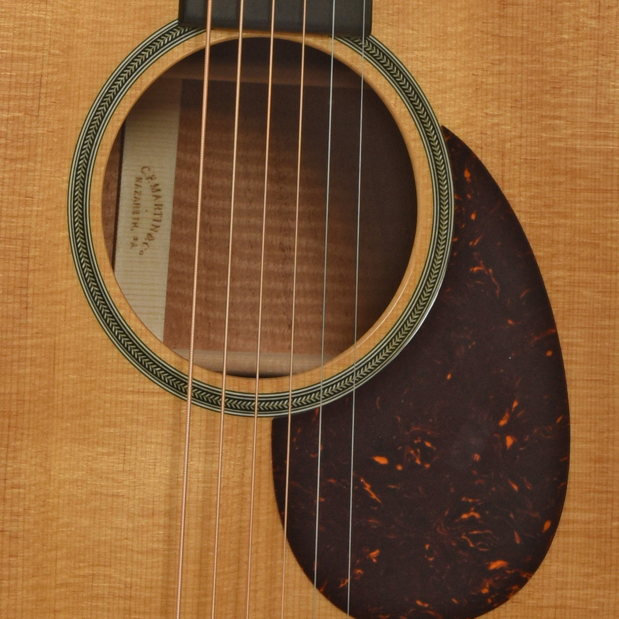 Soundhole of Martin 000 Custom Shop Elderly Sales Staff Select Acoustic Guitar