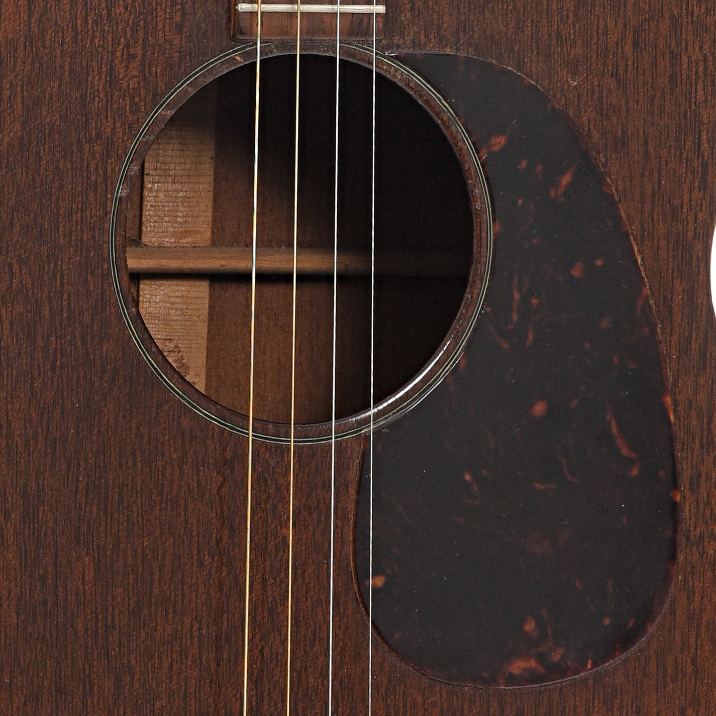 Sound hole and pickguard of Martin 0-17T Tenor Acoustic