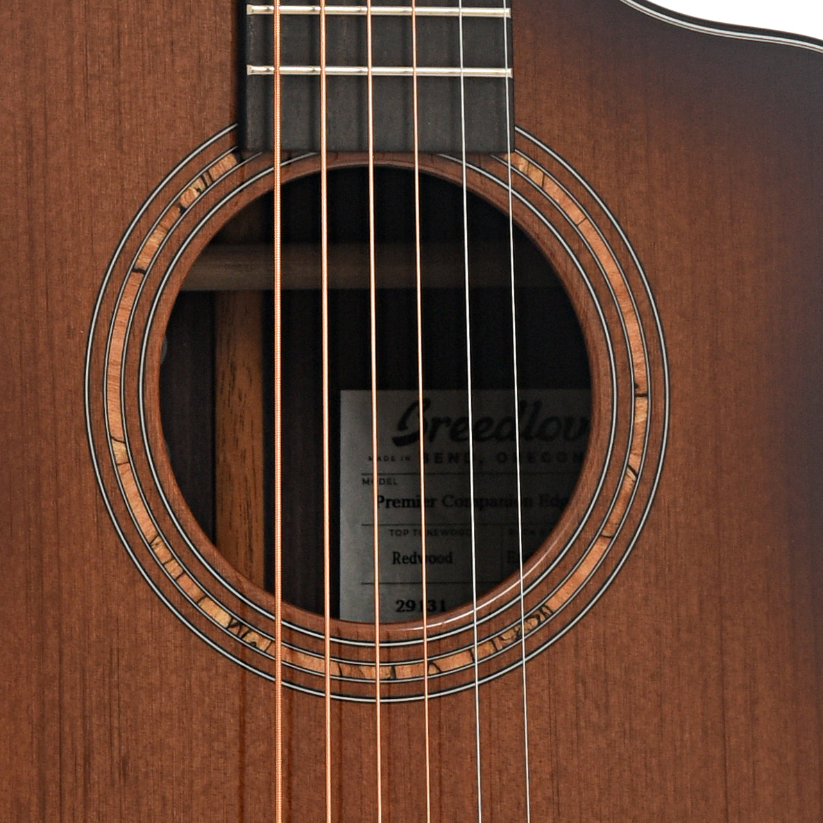 Sound hole of Breedlove Premier Companion Edgeburst CE Redwood-EI Rosewood Acoustic-Electric Guitar