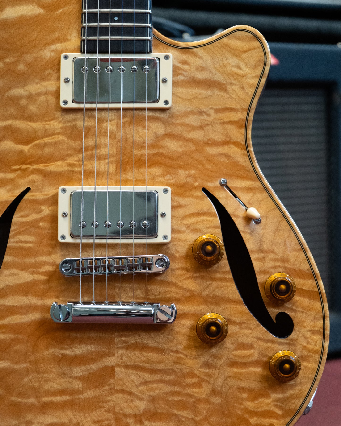 Showroom photo of C.P. Thornton Professional Hollowbody Electric Guitar (c.2011)
