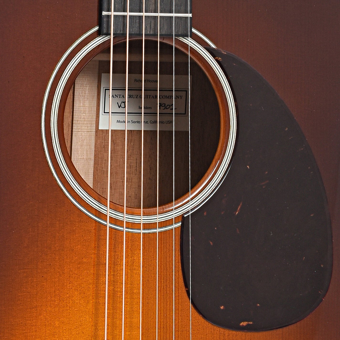 Sound hole and pickguard of Santa Cruz Custom Vintage Jumbo Acoustic Guitar