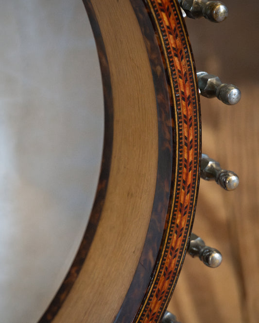 Showroom photo of rim of Fairbanks Whyte Laydie No.7 Open Back Banjo (1908)