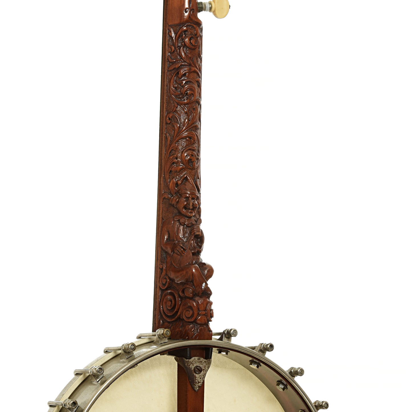 Neck joint/Ornate carving on neck of S.S. Stewart Gnome Open Back Banjo 