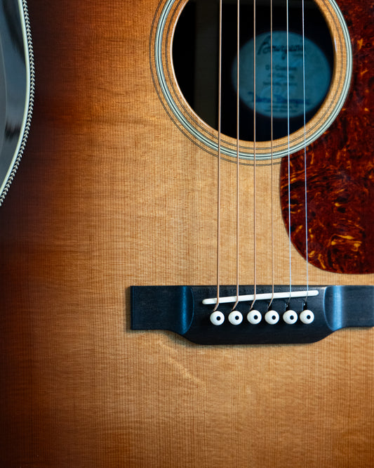 Showroom photo of Bourgeois Custom Vintage Dreadnought Acoustic Guitar, Sunburst Top