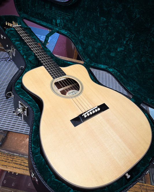 Showroom photo of Bourgeois Legacy Series Soloist OM Cutaway Acoustic Guitar