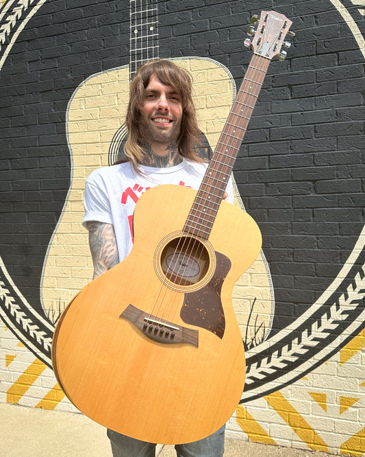 Showroom photo of Taylor Academy 12e Acoustic-Electric Guitar & Gigbag