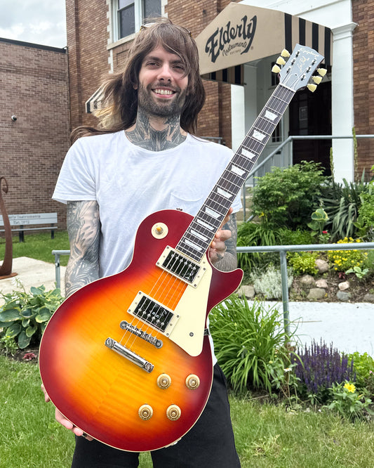 Showroom photo of Epiphone IGC 1959 Les Paul Standard Reissue Electric Guitar & Case, Golden Poppy Burst