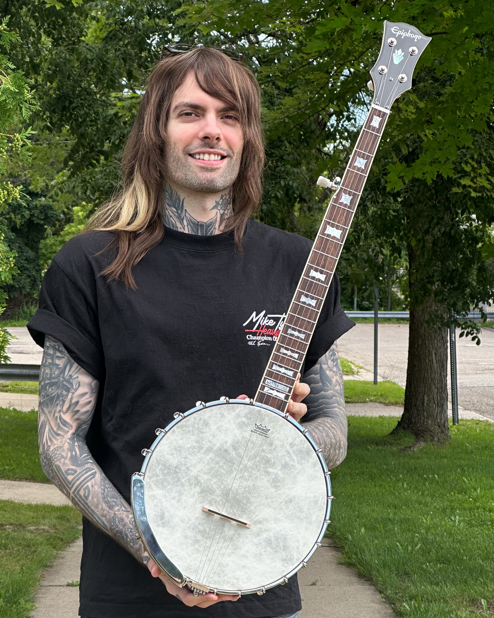 Showroom photo of Epiphone Mastertone Bowtie Openback Banjo & Gigbag