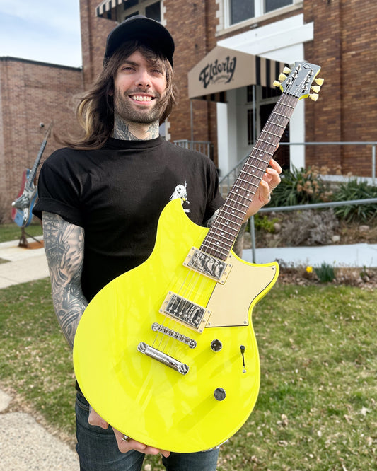 Showroom photo of Yamaha RSE20 Revstar Element Electric Guitar, Neon Yellow