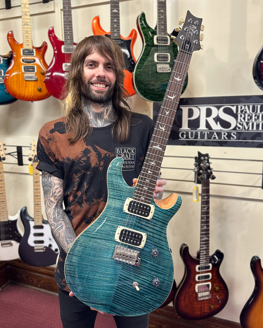 Showroom photo of PRS SE CE24 Electric Guitar, Slate Blue