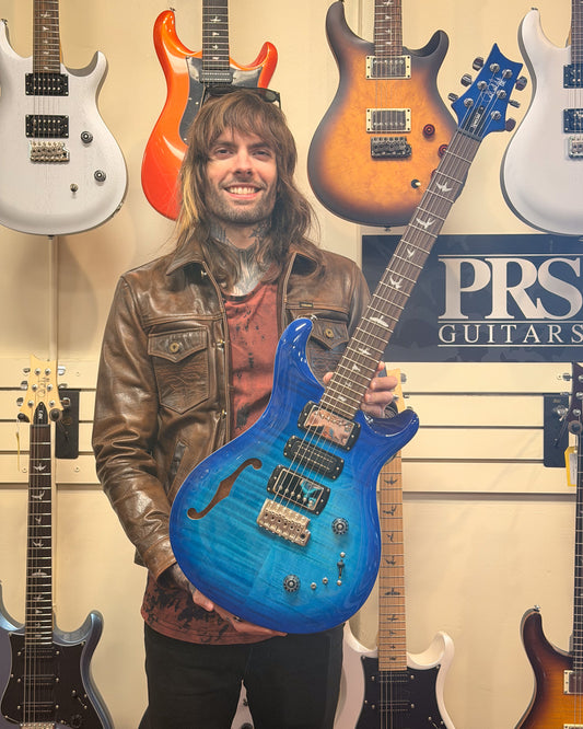 Showroom photo of PRS SE Special Semi-Hollow Electric Guitar & Gigbag, Lake Blue