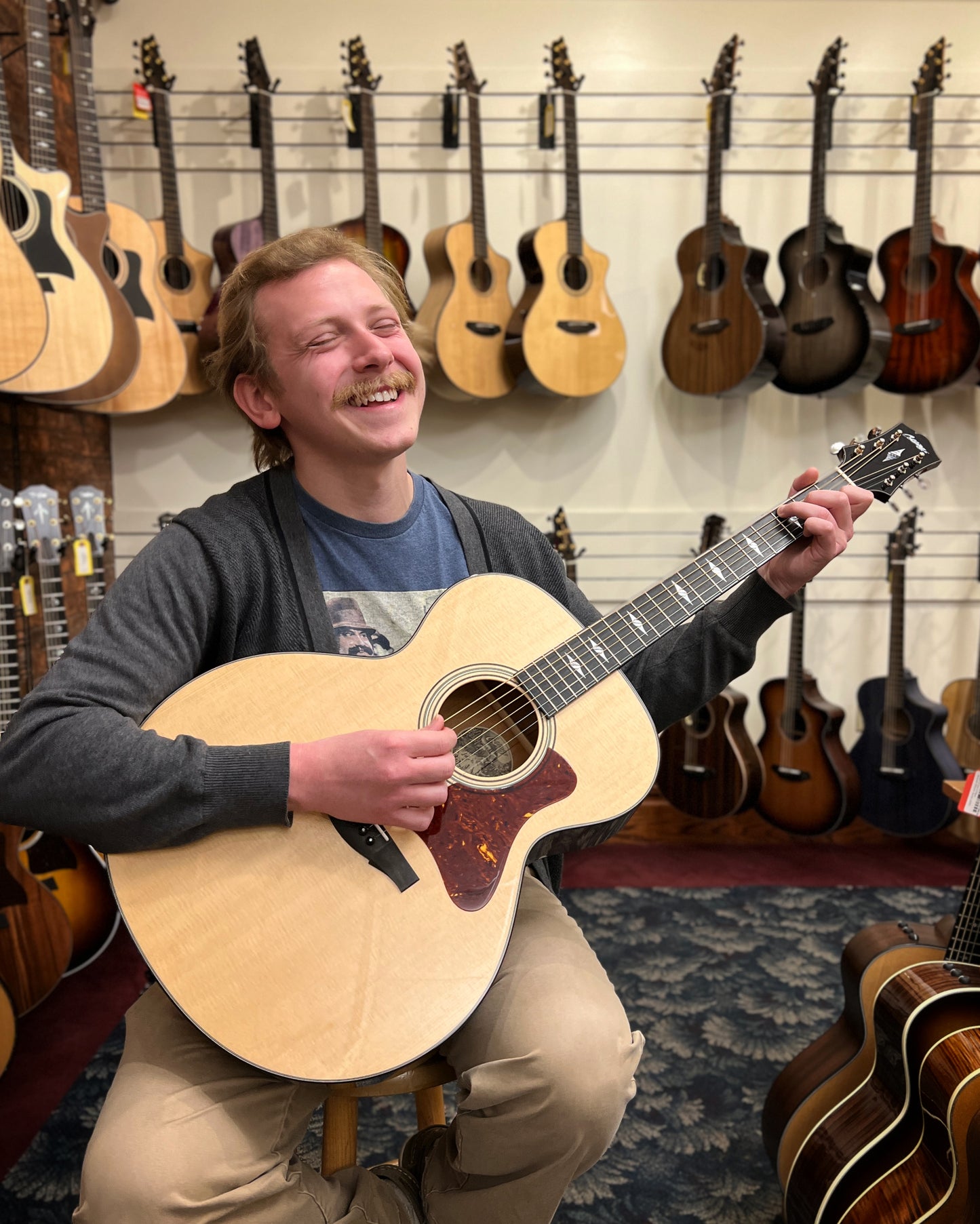 Showroom photo of Collings SJ Mahogany Guitar & Case