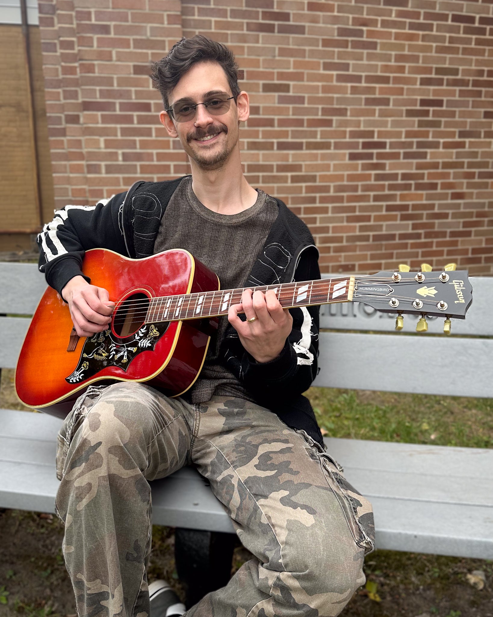 Showroom photo of Gibson Centennial Hummingbird Acoustic Guitar (1994)
