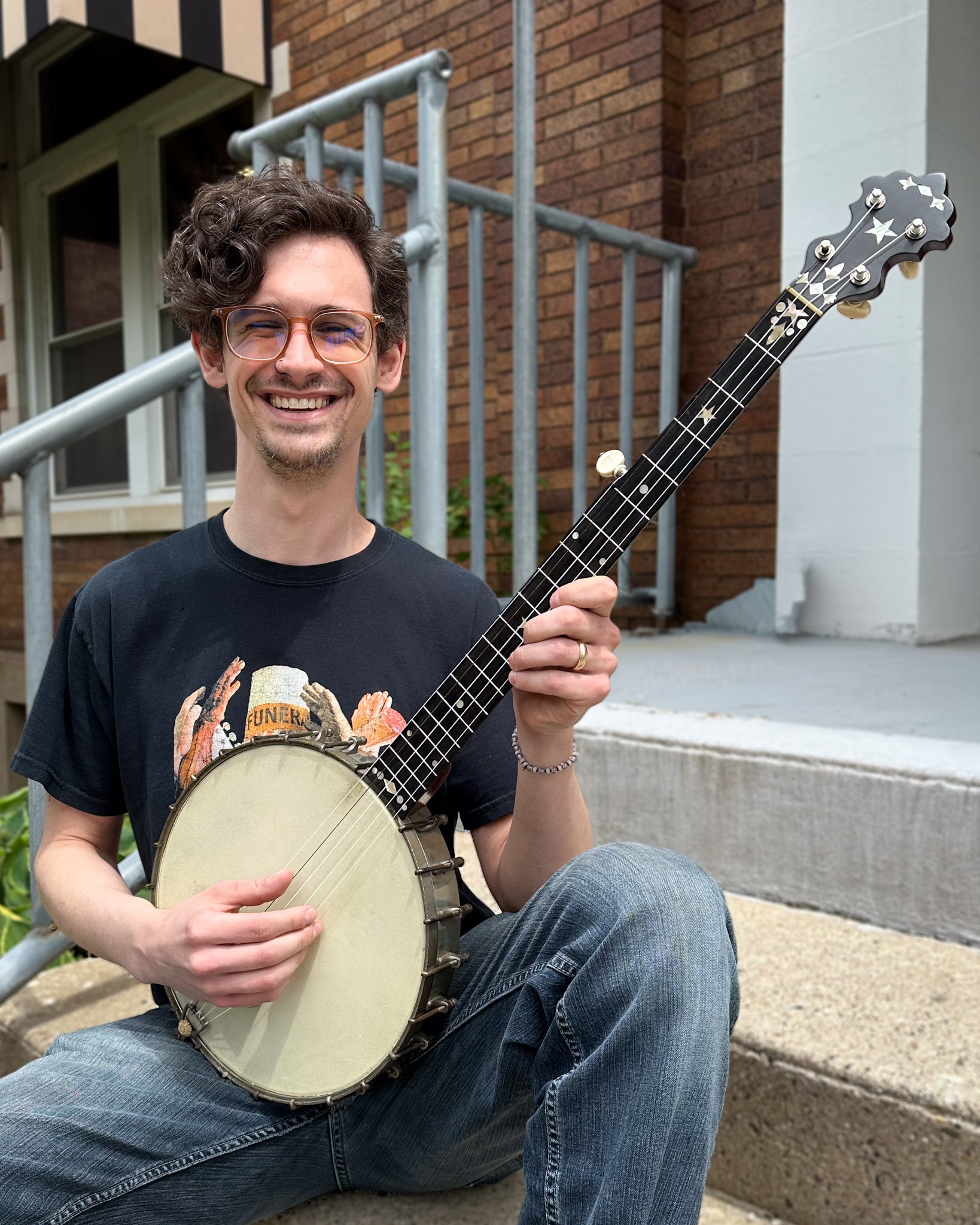 Showroom photo of S.S. Stewart Champion No.1 Open Back Banjo (c.1894)