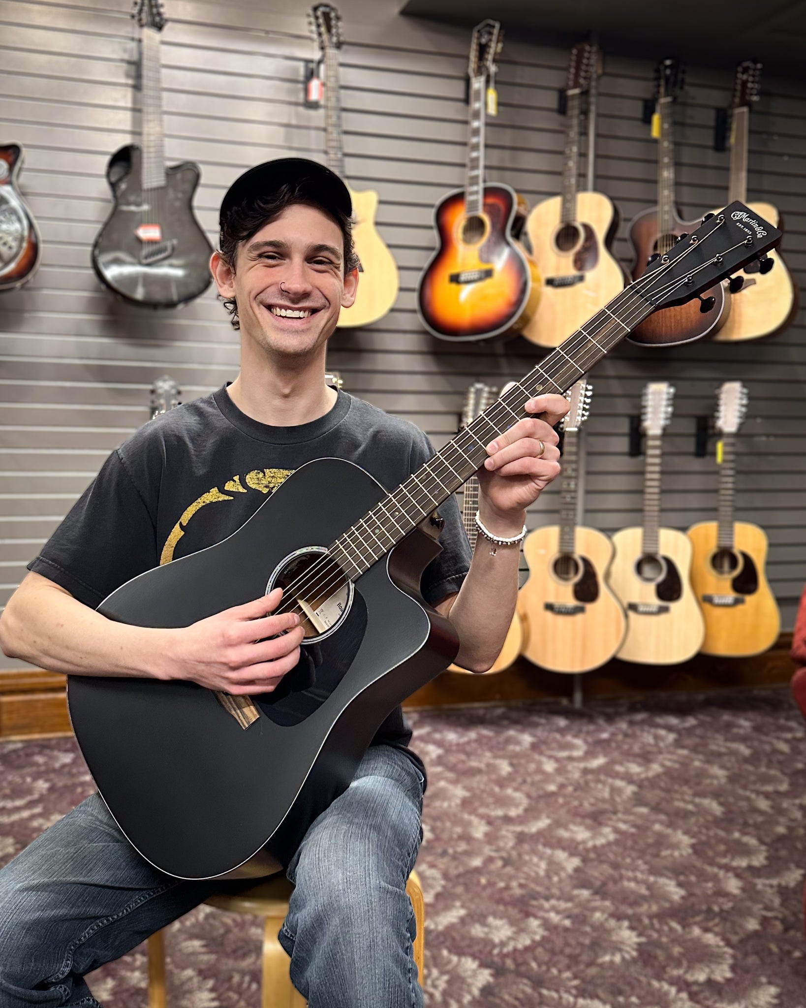 Showroom photo of Martin DC-10E Modern Black Guitar & Gigbag