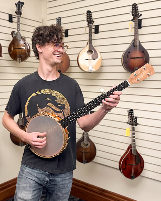 Showroom photo of Ode Moonlight 11" Openback Banjo & Gigbag