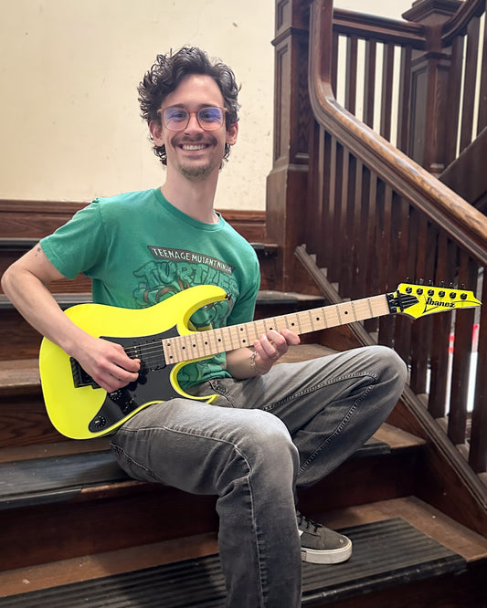 Showroom photo of Ibanez RG550 Genesis Collection Electric Guitar, Desert Sun Yellow