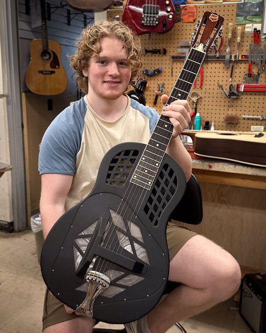 Showroom photo of National K1 Painted Style 1 Tricone Roundneck Resonator Guitar (2003)