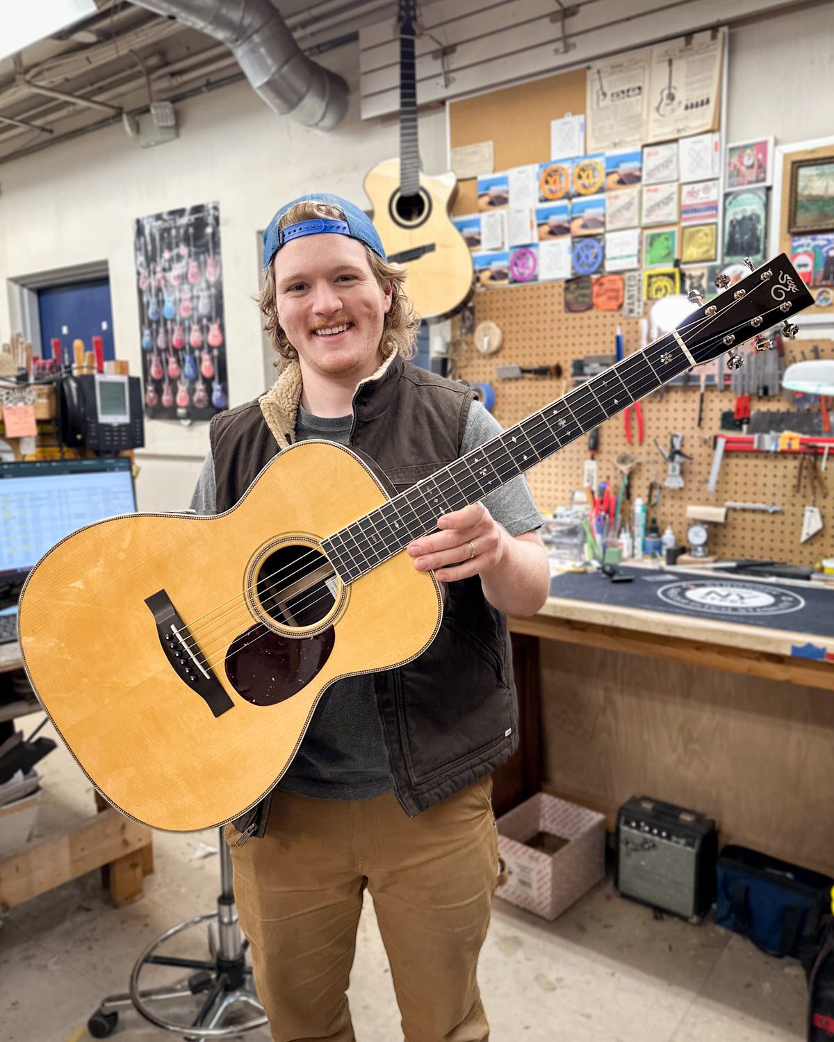Showroom photo of Santa Cruz Custom OM Acoustic Guitar & Case