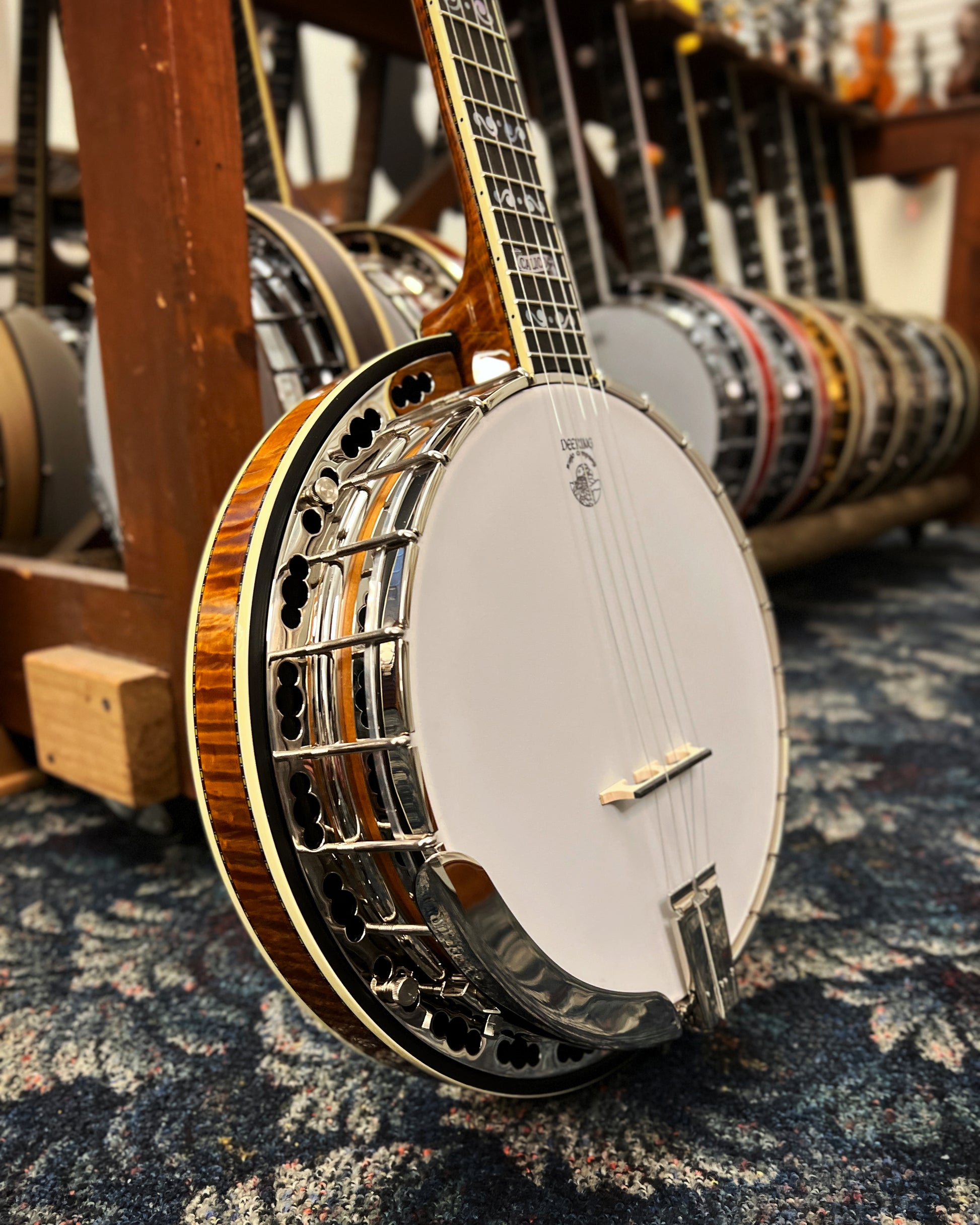 Showroom photo of Deering Calico Banjo & Case, Honey Finish