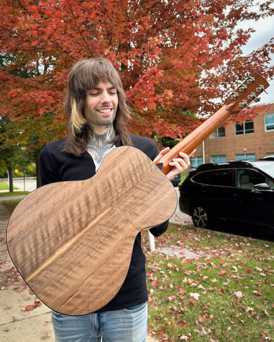 Showroom photo of back of  Cirrus Single 0 Walnut Acoustic Guitar & Case