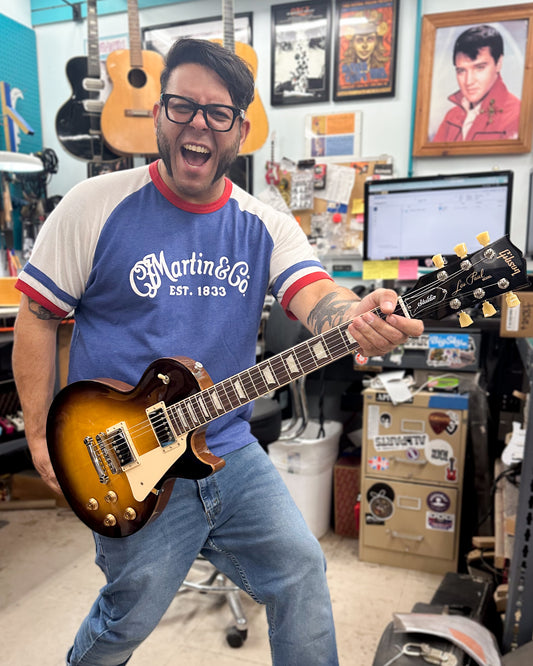 Showroom photo of Gibson Les Paul Studio Electric Guitar & Gigbag, Tobacco Burst